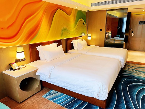 Imagen de la habitación del Hotel Ramada Encore By Wyndham Guangzhou Jiangnanxi. Foto 15