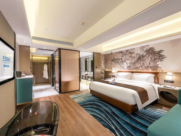 Imagen de la habitación del Hotel Ramada Encore By Wyndham Guangzhou Jiangnanxi. Foto 16