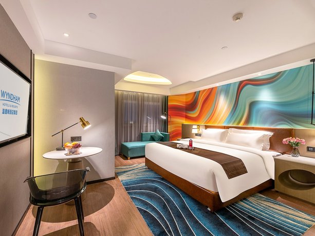 Imagen de la habitación del Hotel Ramada Encore By Wyndham Guangzhou Jiangnanxi. Foto 17