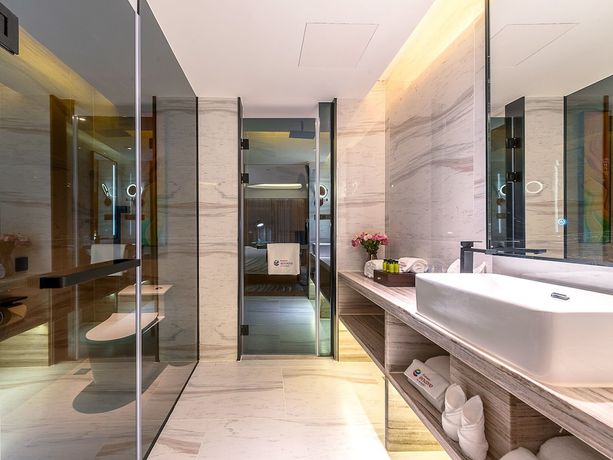 Imagen de la habitación del Hotel Ramada Encore By Wyndham Guangzhou Jiangnanxi. Foto 19