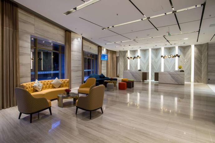 Imagen de los interiores del Hotel Ramada Encore By Wyndham Guangzhou South. Foto 6