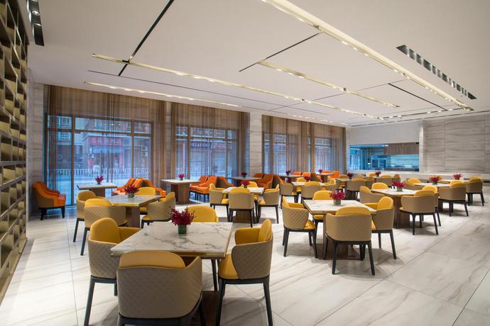 Imagen de los interiores del Hotel Ramada Encore By Wyndham Guangzhou South. Foto 8