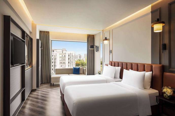 Imagen de la habitación del Hotel Ramada Encore By Wyndham Indore Nipania. Foto 11