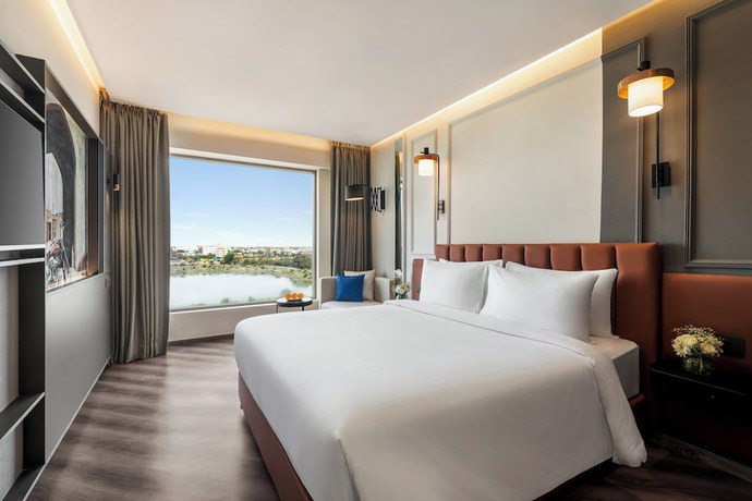 Imagen de la habitación del Hotel Ramada Encore By Wyndham Indore Nipania. Foto 14