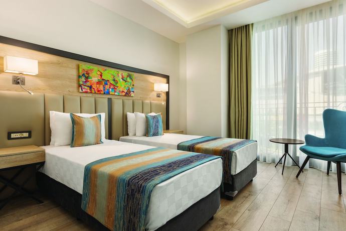 Imagen de la habitación del Hotel Ramada Encore By Wyndham Istanbul Basin Express. Foto 7