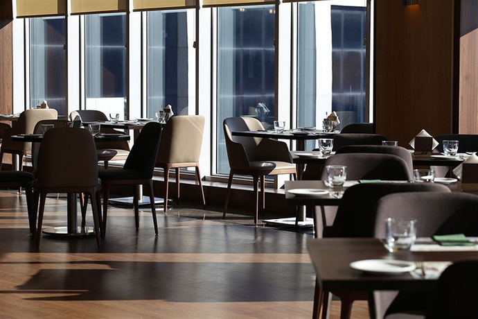 Imagen del bar/restaurante del Hotel Ramada Encore By Wyndham Istanbul Bayrampasa. Foto 4