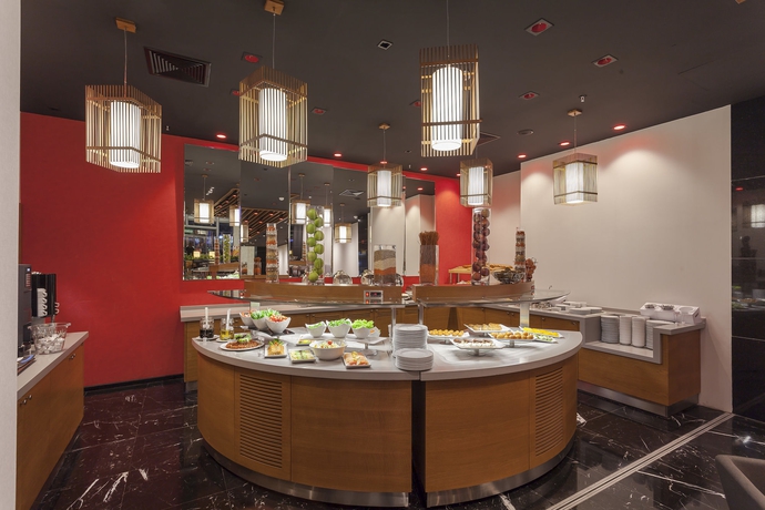 Imagen del bar/restaurante del Hotel Ramada Encore By Wyndham Izmir. Foto 4