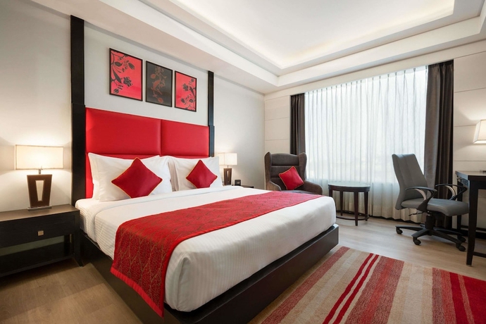 Imagen de la habitación del Hotel Ramada Encore By Wyndham Jalandhar. Foto 3