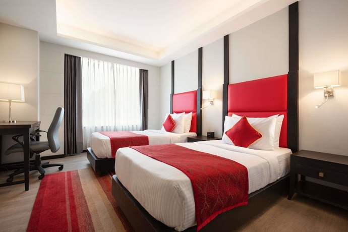 Imagen de la habitación del Hotel Ramada Encore By Wyndham Jalandhar. Foto 7