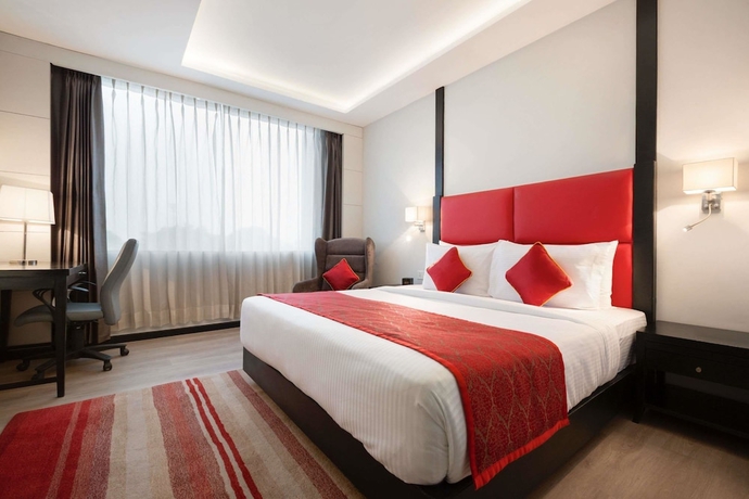 Imagen de la habitación del Hotel Ramada Encore By Wyndham Jalandhar. Foto 9