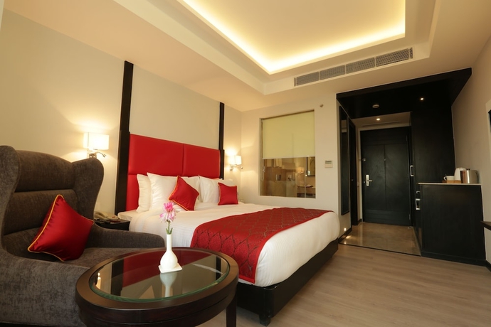 Imagen de la habitación del Hotel Ramada Encore By Wyndham Jalandhar. Foto 10