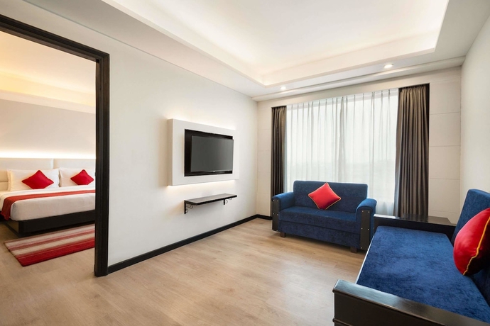 Imagen de la habitación del Hotel Ramada Encore By Wyndham Jalandhar. Foto 12