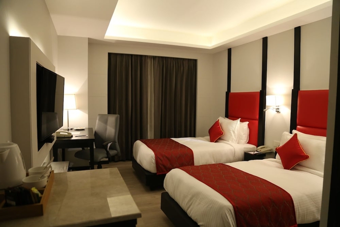 Imagen de la habitación del Hotel Ramada Encore By Wyndham Jalandhar. Foto 13