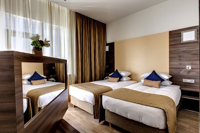 Imagen de la habitación del Hotel Ramada Encore By Wyndham Kyiv. Foto 12