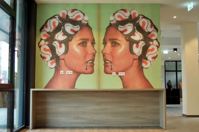 Imagen de los interiores del Hotel Ramada Encore By Wyndham Munich Messe. Foto 18