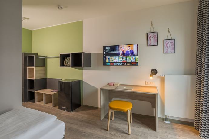 Imagen de la habitación del Hotel Ramada Encore By Wyndham Munich Messe. Foto 4