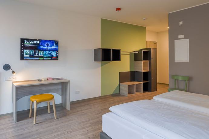 Imagen de la habitación del Hotel Ramada Encore By Wyndham Munich Messe. Foto 12