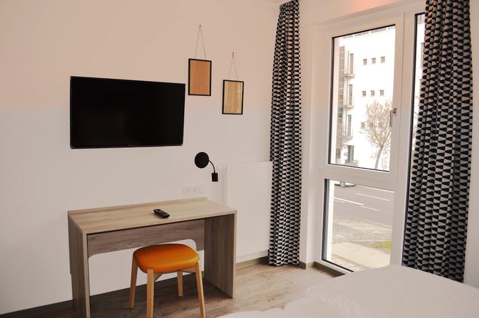 Imagen de la habitación del Hotel Ramada Encore By Wyndham Munich Messe. Foto 13