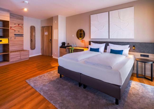 Imagen de la habitación del Hotel Ramada Encore By Wyndham Munich Messe. Foto 2