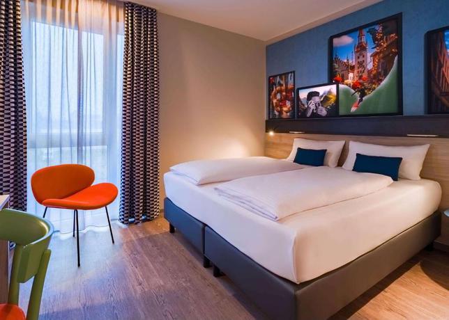 Imagen de la habitación del Hotel Ramada Encore By Wyndham Munich Messe. Foto 3