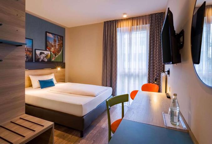 Imagen de la habitación del Hotel Ramada Encore By Wyndham Munich Messe. Foto 4