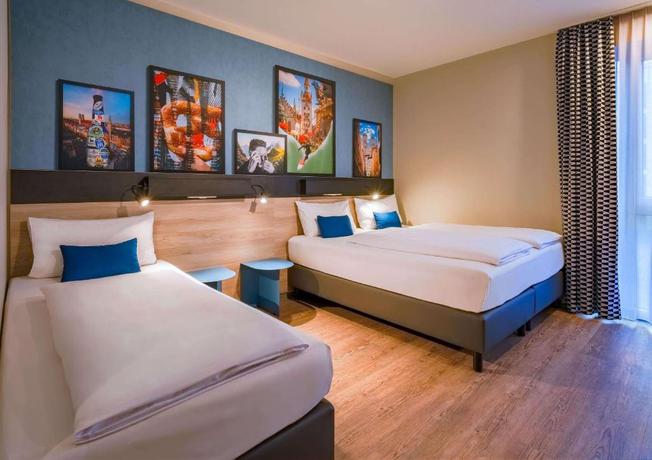 Imagen de la habitación del Hotel Ramada Encore By Wyndham Munich Messe. Foto 5