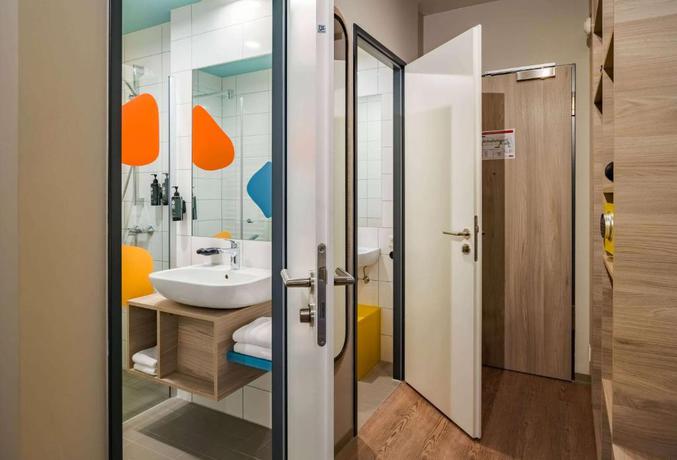 Imagen de la habitación del Hotel Ramada Encore By Wyndham Munich Messe. Foto 7
