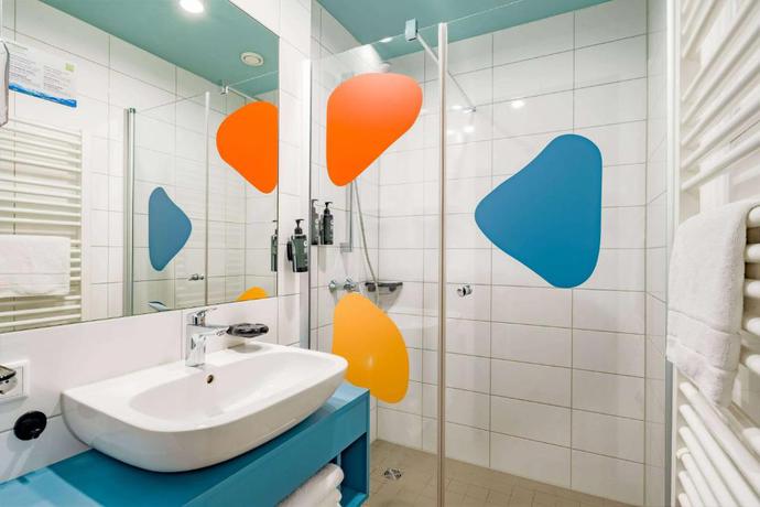 Imagen de la habitación del Hotel Ramada Encore By Wyndham Munich Messe. Foto 8