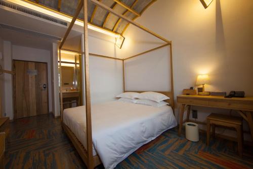 Imagen de la habitación del Hotel Ramada Encore By Wyndham Shanghai Pudong Airport. Foto 5