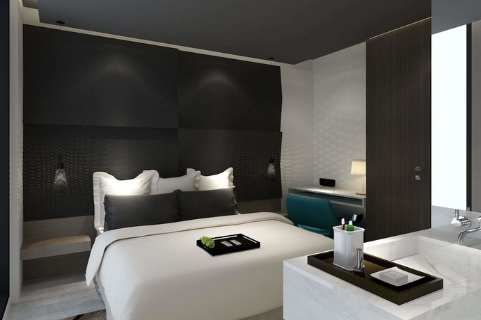 Imagen de la habitación del Hotel Ramada Encore By Wyndham Yangzhoudong Railway Station. Foto 2