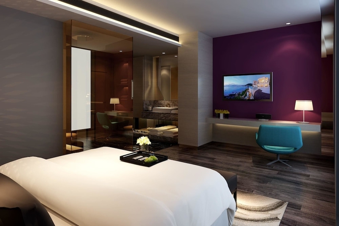 Imagen de la habitación del Hotel Ramada Encore By Wyndham Yangzhoudong Railway Station. Foto 5
