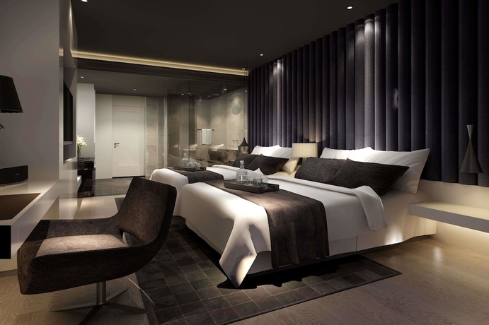 Imagen de la habitación del Hotel Ramada Encore By Wyndham Yangzhoudong Railway Station. Foto 8