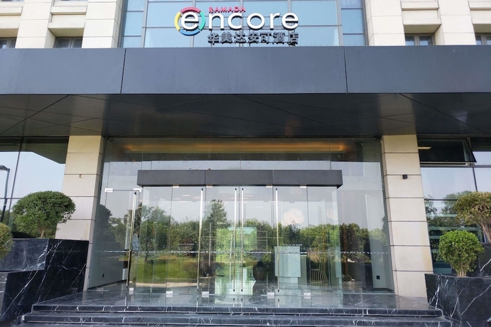 Imagen general del Hotel Ramada Encore By Wyndham Yangzhoudong Railway Station. Foto 1