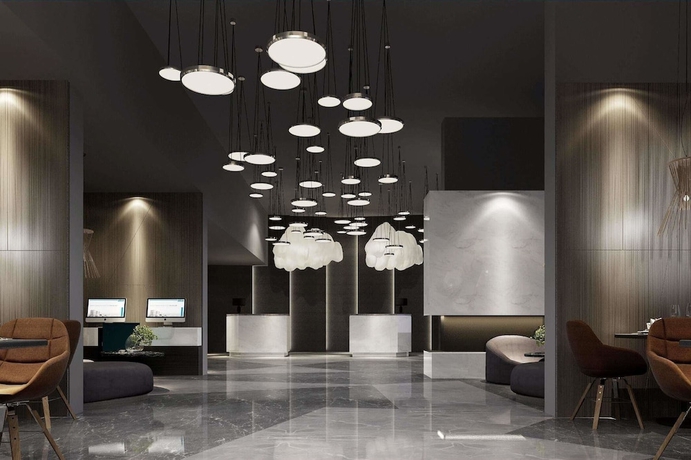 Imagen de los interiores del Hotel Ramada Encore By Wyndham Yangzhoudong Railway Station. Foto 17