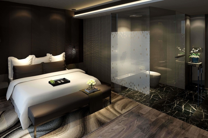 Imagen de la habitación del Hotel Ramada Encore By Wyndham Yangzhoudong Railway Station. Foto 12