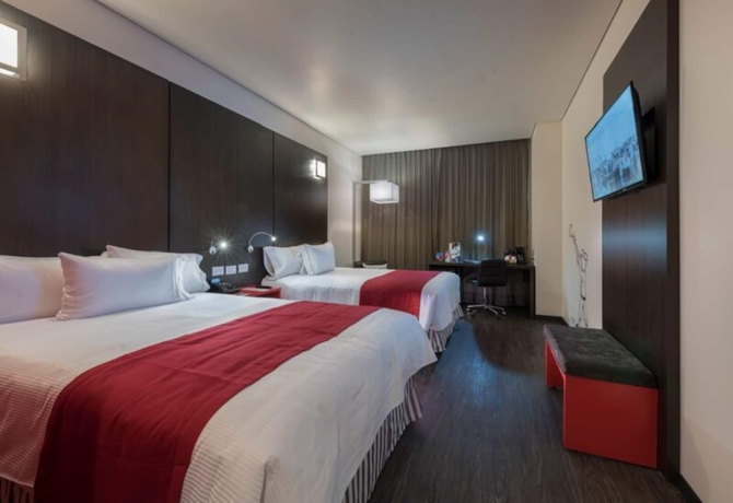Imagen de la habitación del Hotel Ramada Encore Puebla Mexico. Foto 6