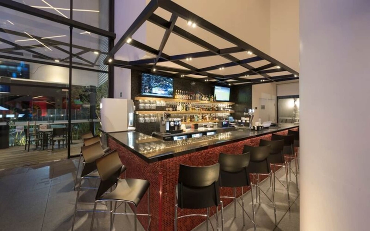 Imagen del bar/restaurante del Hotel Ramada Encore Puebla Mexico. Foto 2