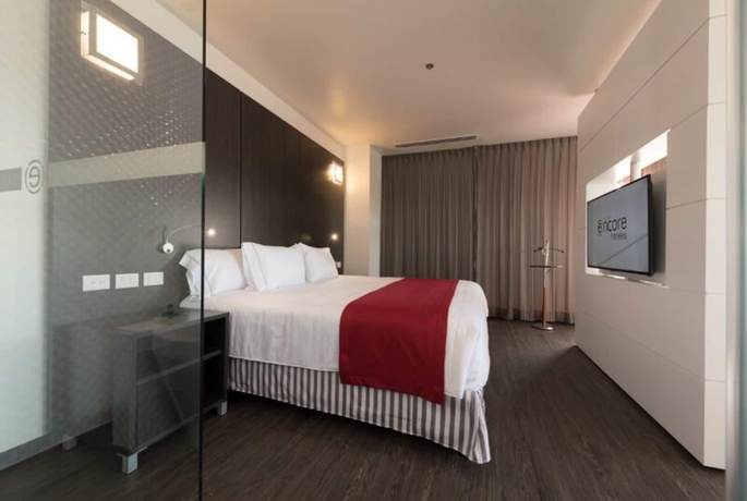 Imagen de la habitación del Hotel Ramada Encore Puebla Mexico. Foto 10