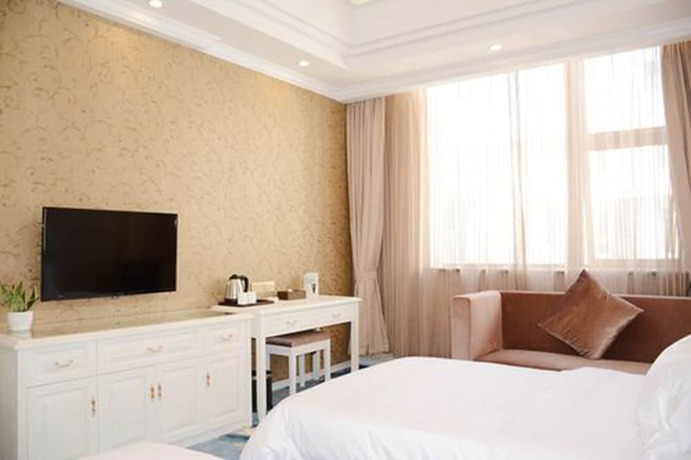 Imagen de la habitación del Hotel Ramada Encore Shanghai Pudong. Foto 4