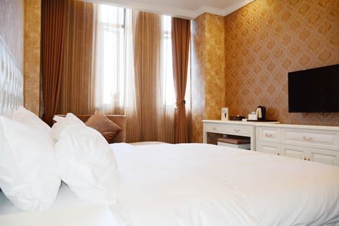 Imagen de la habitación del Hotel Ramada Encore Shanghai Pudong. Foto 7