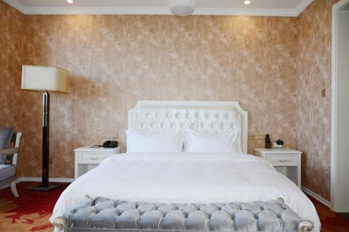 Imagen de la habitación del Hotel Ramada Encore Shanghai Pudong. Foto 11