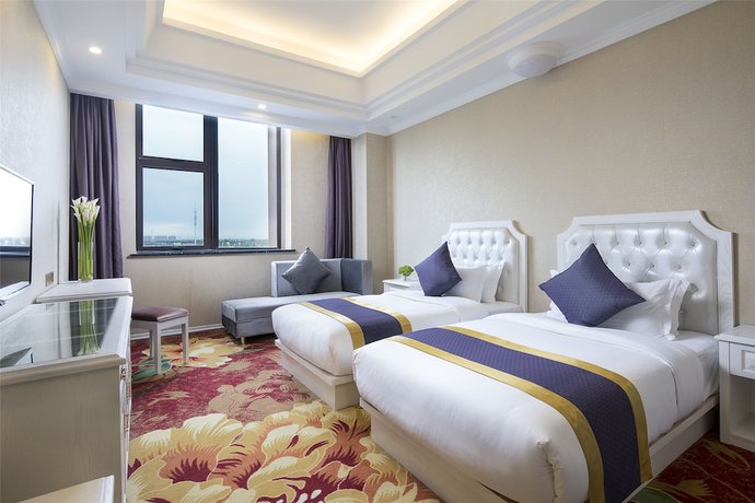 Imagen de la habitación del Hotel Ramada Encore Shanghai Pudong. Foto 13
