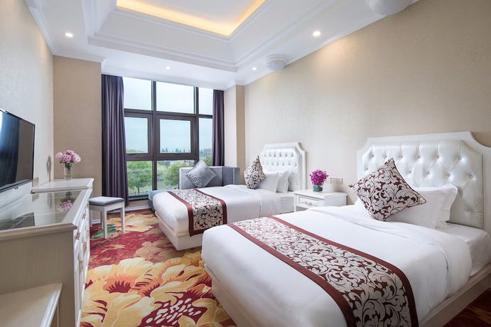 Imagen de la habitación del Hotel Ramada Encore Shanghai Pudong. Foto 14
