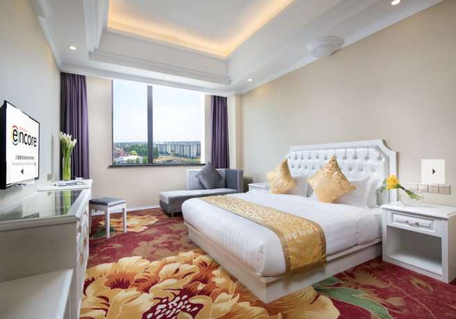 Imagen de la habitación del Hotel Ramada Encore Shanghai Pudong. Foto 15