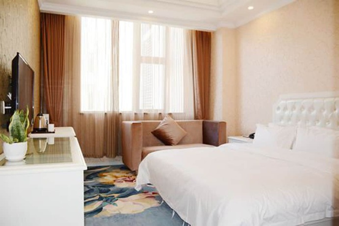 Imagen de la habitación del Hotel Ramada Encore Shanghai Pudong. Foto 16