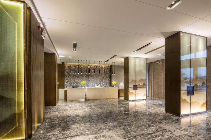 Imagen de los interiores del Hotel Ramada Encore Wyndham Huzhou. Foto 20