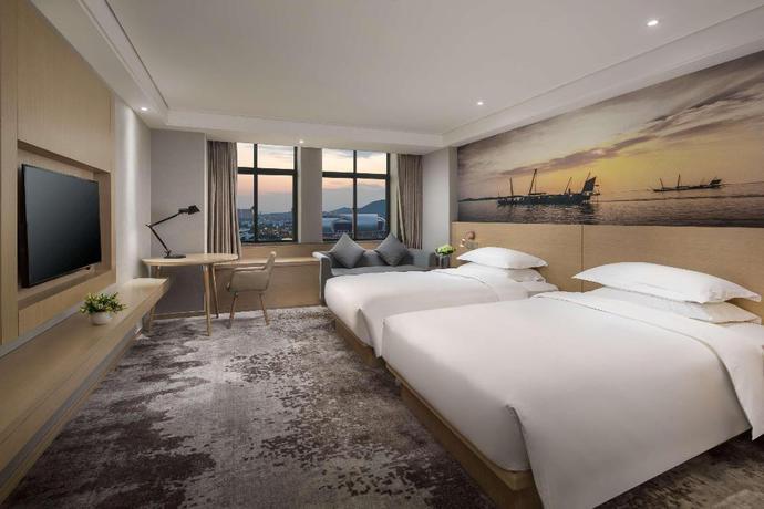 Imagen de la habitación del Hotel Ramada Encore Wyndham Huzhou. Foto 6