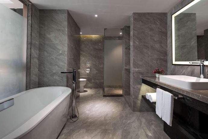 Imagen de la habitación del Hotel Ramada Encore Wyndham Huzhou. Foto 10