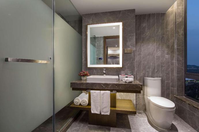 Imagen de la habitación del Hotel Ramada Encore Wyndham Huzhou. Foto 11