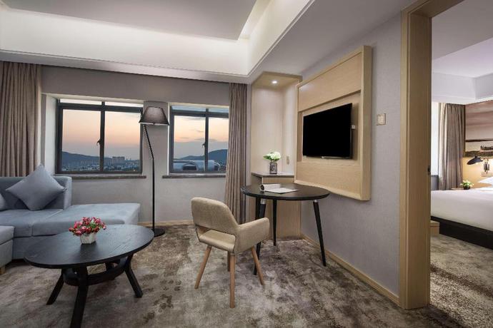 Imagen de la habitación del Hotel Ramada Encore Wyndham Huzhou. Foto 12